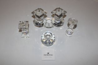 A Swarovski twin branch candle stand and three sma