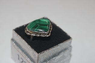 A silver malachite set ring