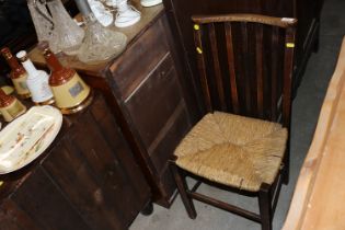 An oak Arts & Crafts type chair