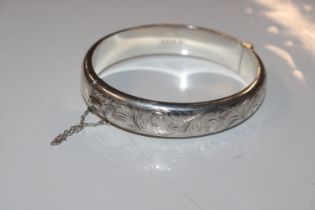 A Sterling silver snap bangle, approx. 20gms