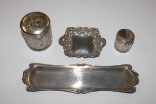 A pierced silver dish; a silver pen tray and two s