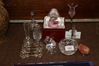 A collection of various decorative glassware, hard