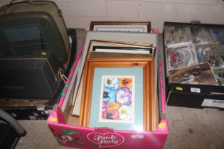 A box of pictures and prints