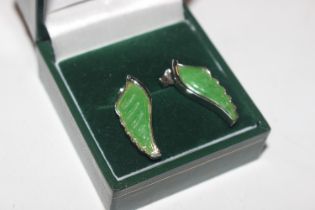 A pair of silver and green wing ear-rings