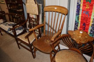 An elm seated stick back elbow chair