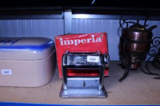 An Imperia rotary pasta maker with original box an