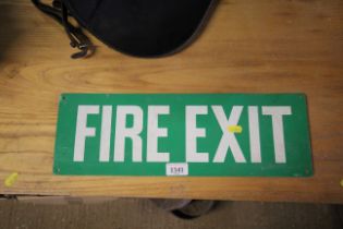 A vintage tin plated fire exit sign