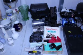 A quantity of various cameras and camcorders to in