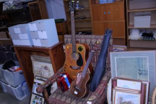 An Hokada acoustic guitar and other instruments