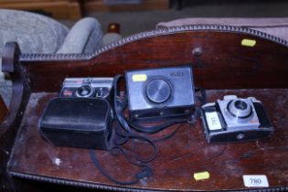 Three Kodak cameras