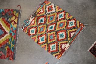 An approx. 1'8" x 1'6" Chobi Kelim rug