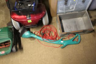 A Bosch Easy Trim ART26 electric strimmer