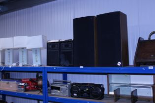 A pair of Celestian UL8 speakers together with a p