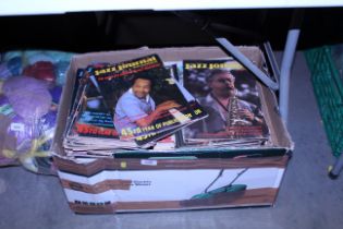 A box containing 'Jazz Journal' magazines