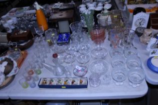 A quantity of drinking glasses, vases etc