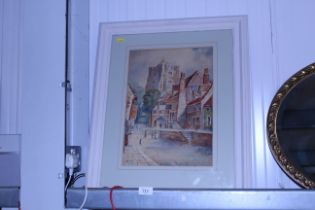 A framed watercolour depicting a street scene, sig