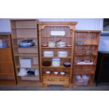 A pine open fronted bookcase with adjustable shelv