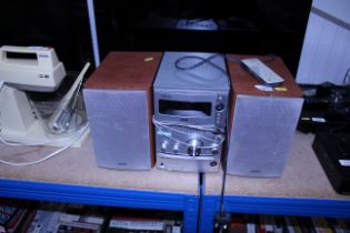 A Sony DAB hi-fi and a pair of speakers and remote