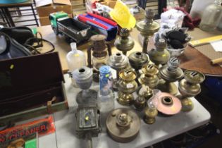 A large quantity of glass and other oil lamp bases