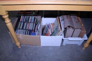 Three boxes containing LPs and CDs