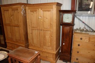 A pine wardrobe fitted single drawer below