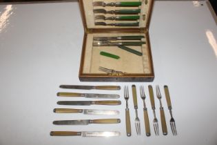 Six each silver bladed and silver tine fruit knive