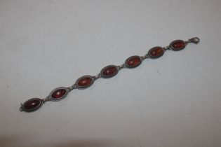 A Sterling silver and amber bracelet