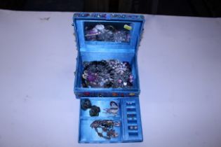 A decorative sequin decorated jewellery box and co