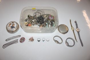 A box of various costume jewellery