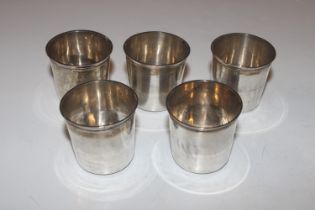 Five silver shot cups, approx. total weight 82gms