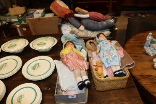 A quantity of vintage dolls, doll's bed etc.