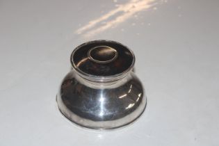 A silver inkwell