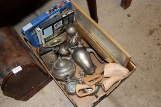 A box containing various silver plated ware; model
