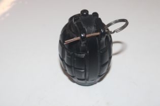 A WWII practice Resin Mills hand grenade