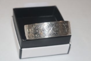 A Kirwan & Co. Ltd. Birmingham silver snap bangle,