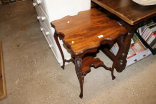 An Edwardian mahogany centre table and a cane seat