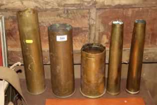 A quantity of WWI and WWII shell cases