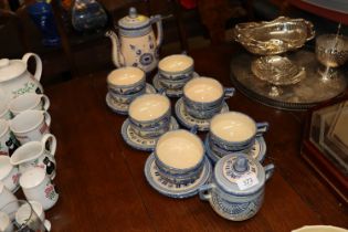 A collection of Quimper pottery teaware