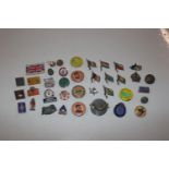 A bag of mixed badges and buttons etc.