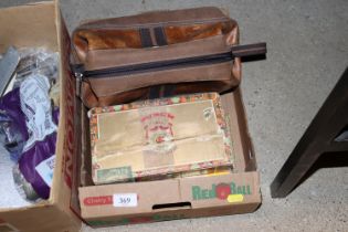 A box containing vintage cigar boxes and a men's F