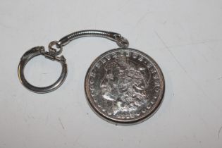 A 1921 silver Morgan dollar in key-ring