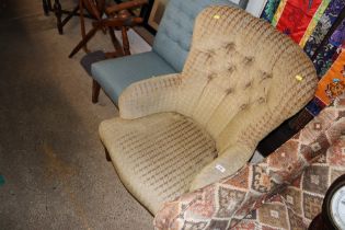 A button down upholstered nursing chair