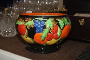 A Sheila Gibson bowl decorated with fruit