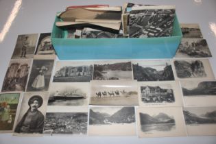 A box of post-cards and ephemera