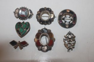 A collection of Scottish Sterling silver brooches