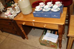A pine dressing table fitted two drawers