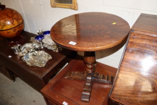 An Ipswich oak pedestal circular topped side table