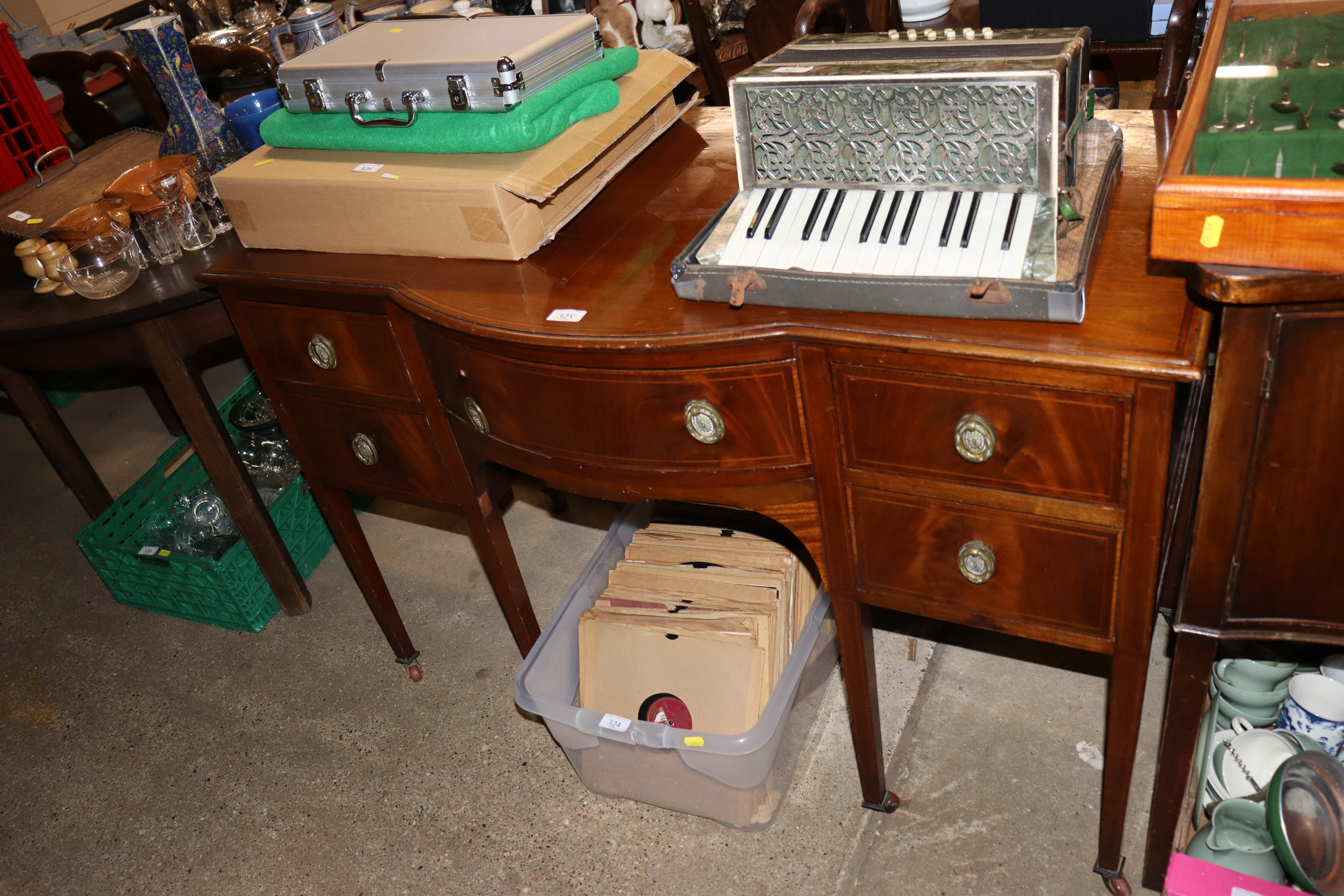 A mahogany bow fronted sideboard - lacking back