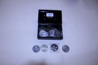 A small cash box and contents including crowns, Or