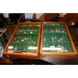 Two souvenir spoon display cases and contents